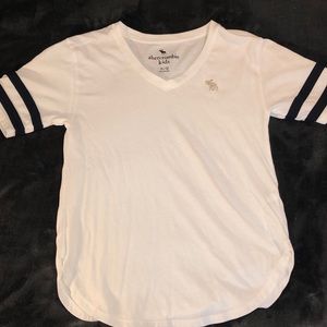 White flowy t-shirt with blue stripes on sleeves